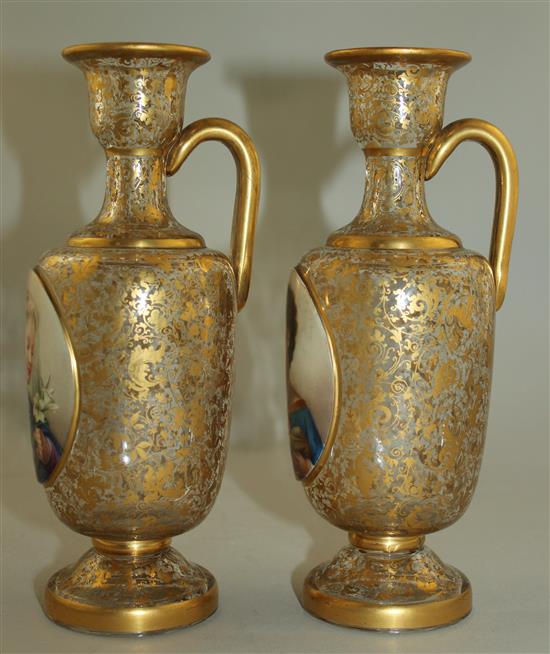 A pair of Bohemian enamelled and gilt decorated glass ewers, late 19th century, 20.5cm
